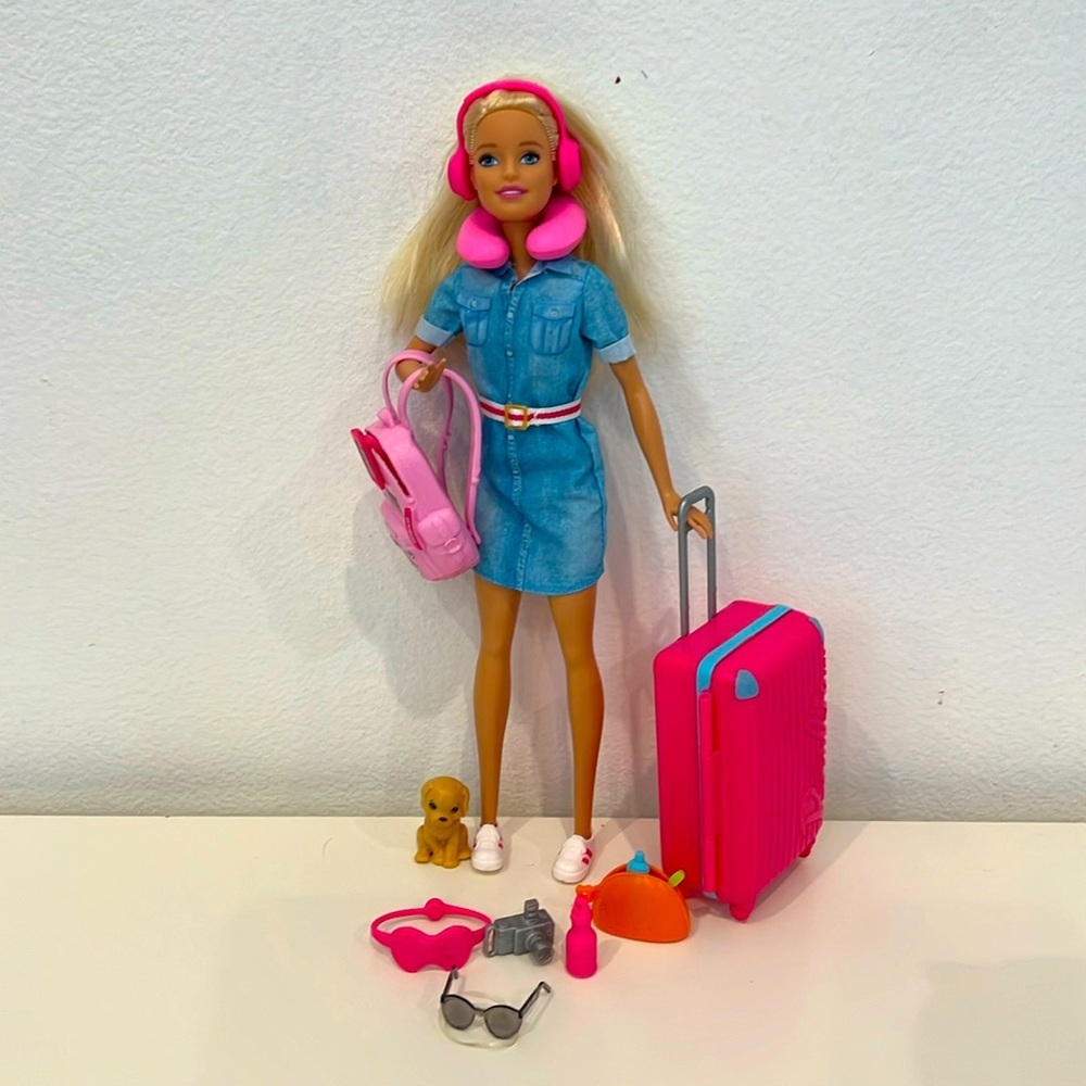 Barbie travel doll with dog